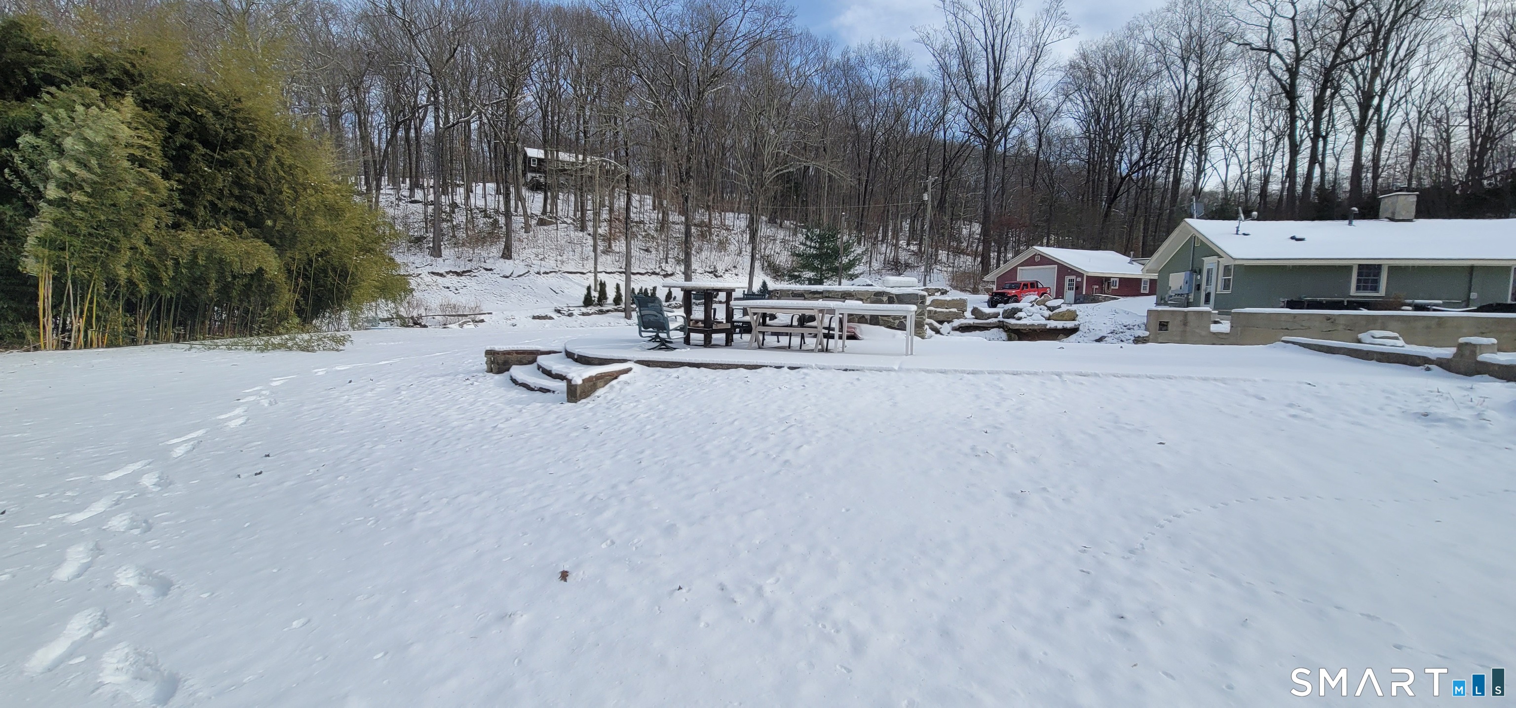 134 Nashville Road Bethel, CT 06801 - Photo 34 of 36 a view of a park with swings and slides