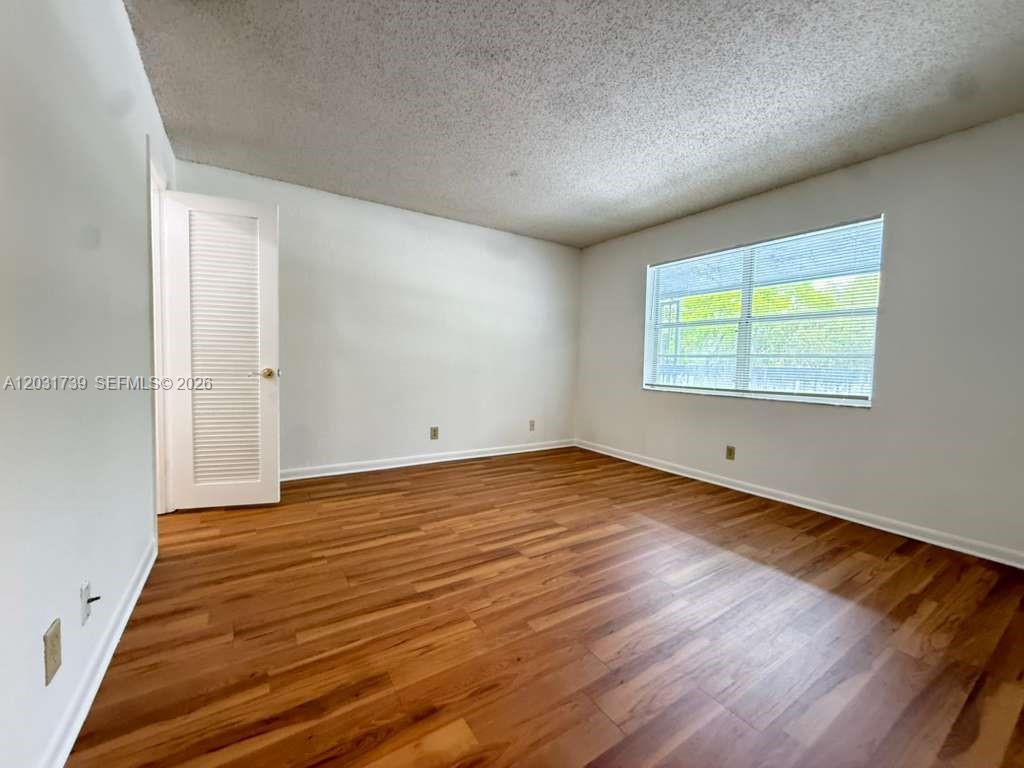 8982 West Sample Road, Unit 204 Coral Springs, FL 33065 - Photo 17 of 21 2nd Bedroom