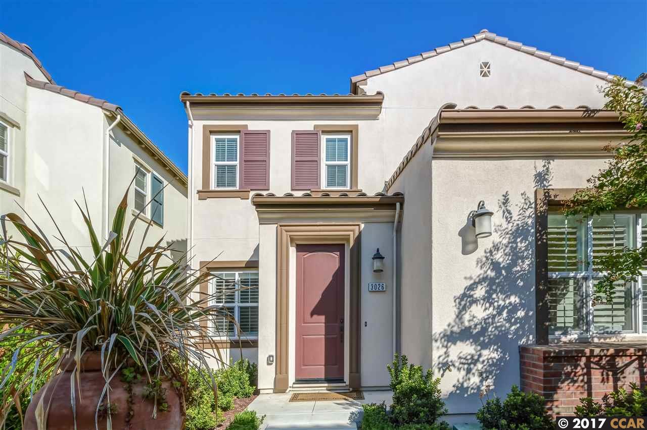 a view of a house with a door and a window