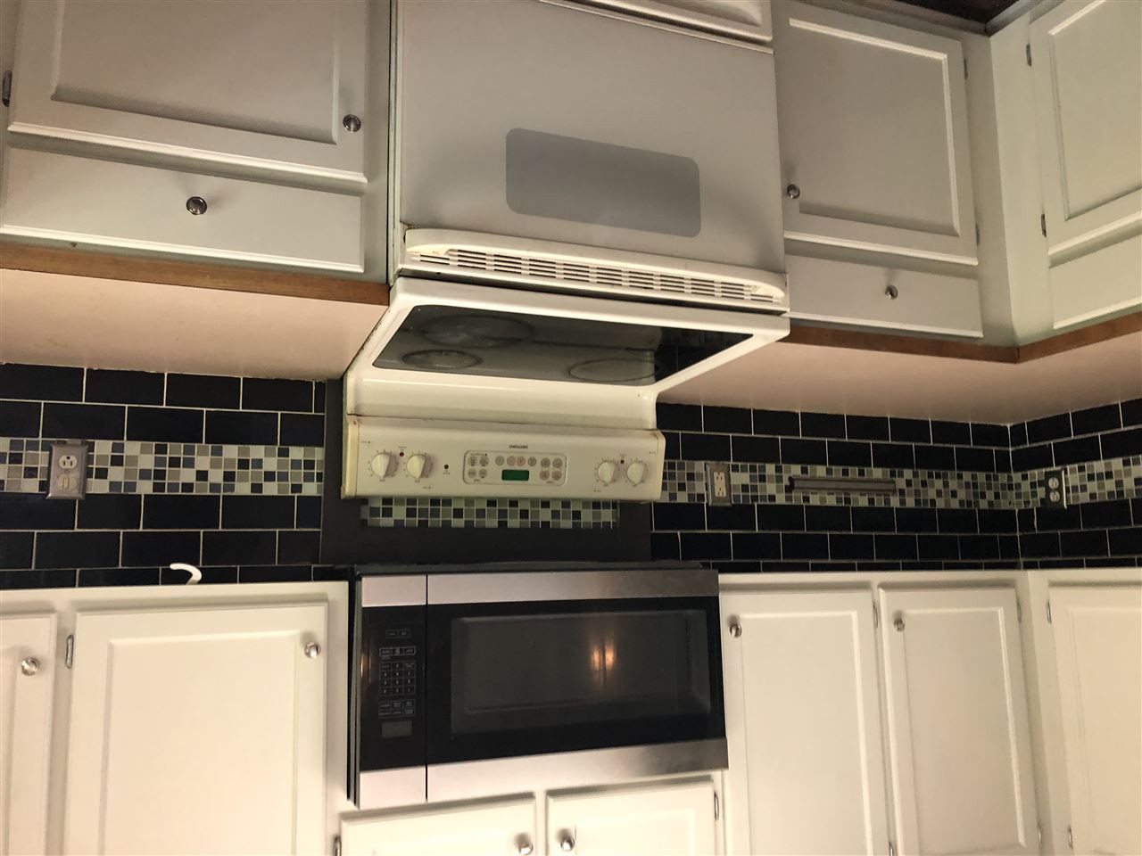 2518 Siler Road Snow Camp, NC 27349 - Photo 7 of 24 Being replaced with stainless electric range. Range with Microwave