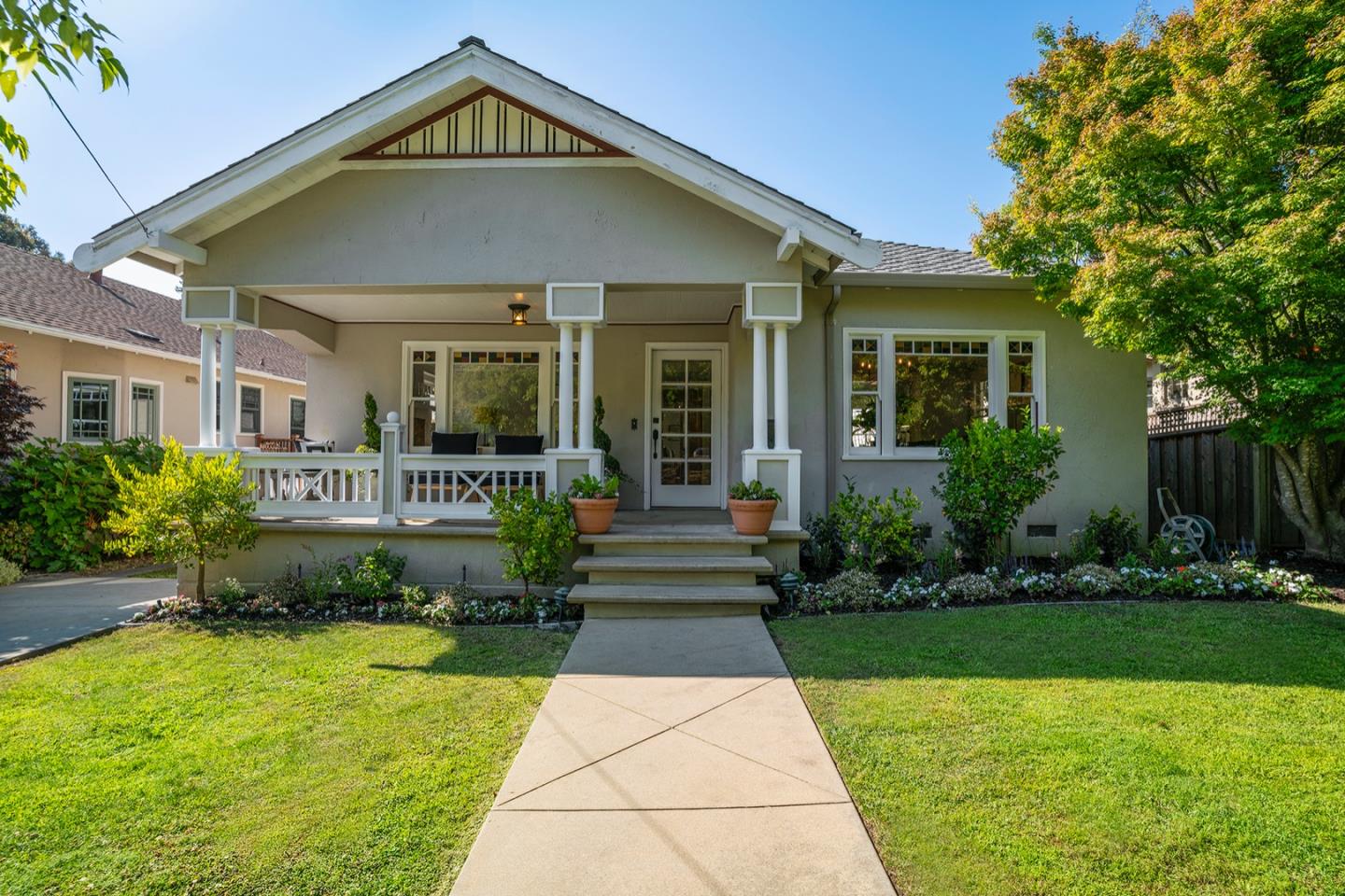 166 Warren Road San Mateo, CA 94401 - Photo 1 of 21 a front view of a house with a yard