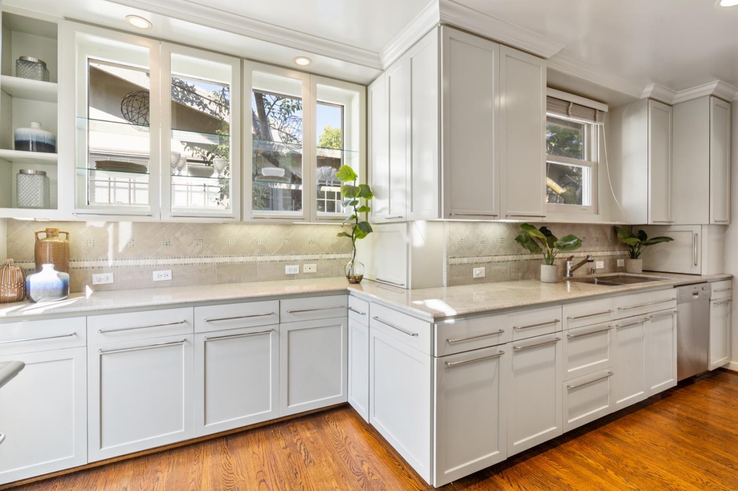 166 Warren Road San Mateo, CA 94401 - Photo 12 of 21 a kitchen with stainless steel appliances granite countertop a sink and cabinets