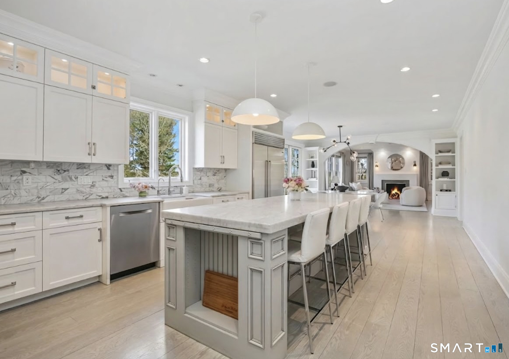 127 Fields Rock Road Fairfield, CT 06890 - Photo 19 of 45 a large kitchen with a large counter top appliances and cabinets