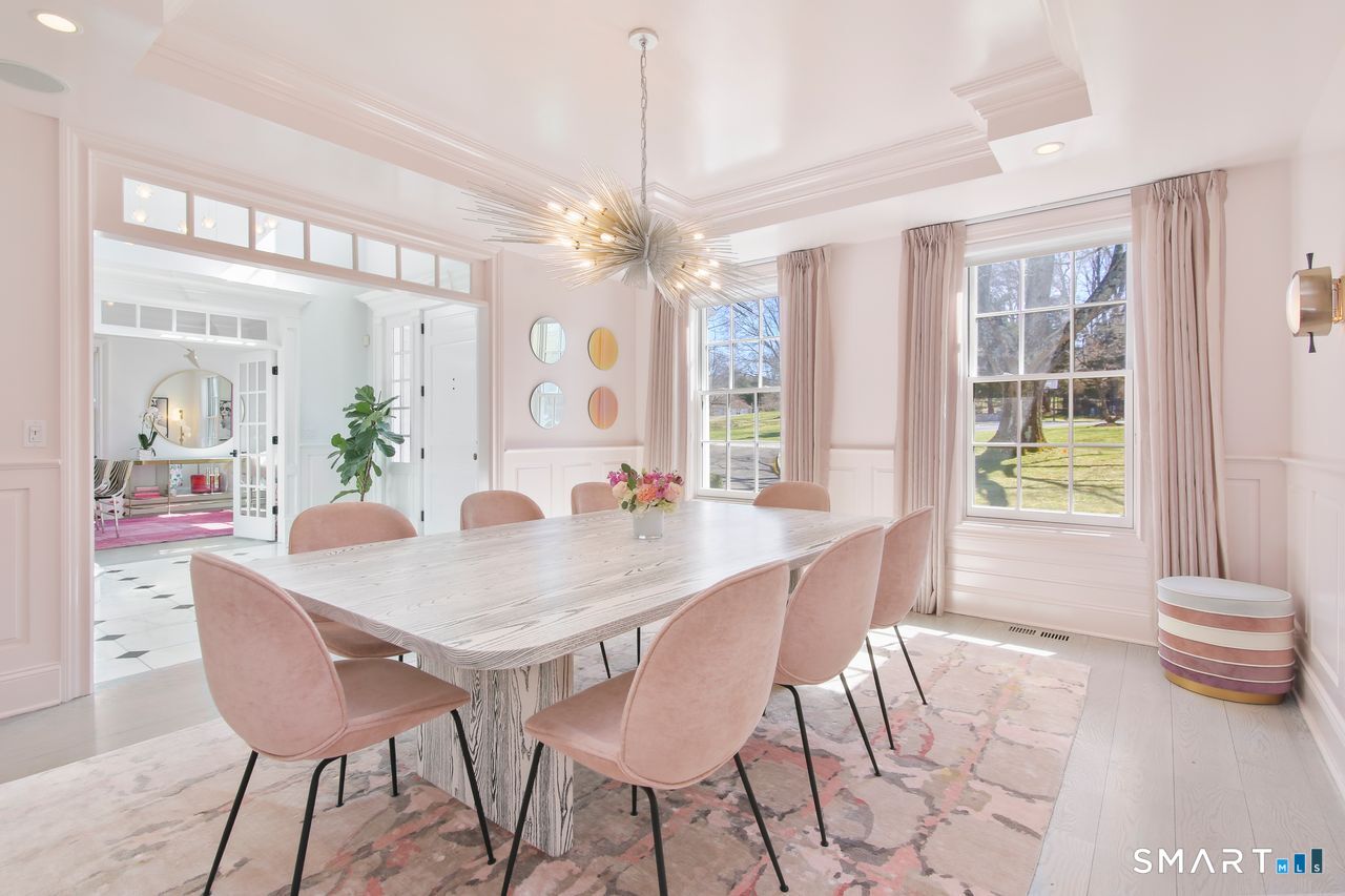 127 Fields Rock Road Fairfield, CT 06890 - Photo 20 of 45 a view of a dining room with furniture window and outside view
