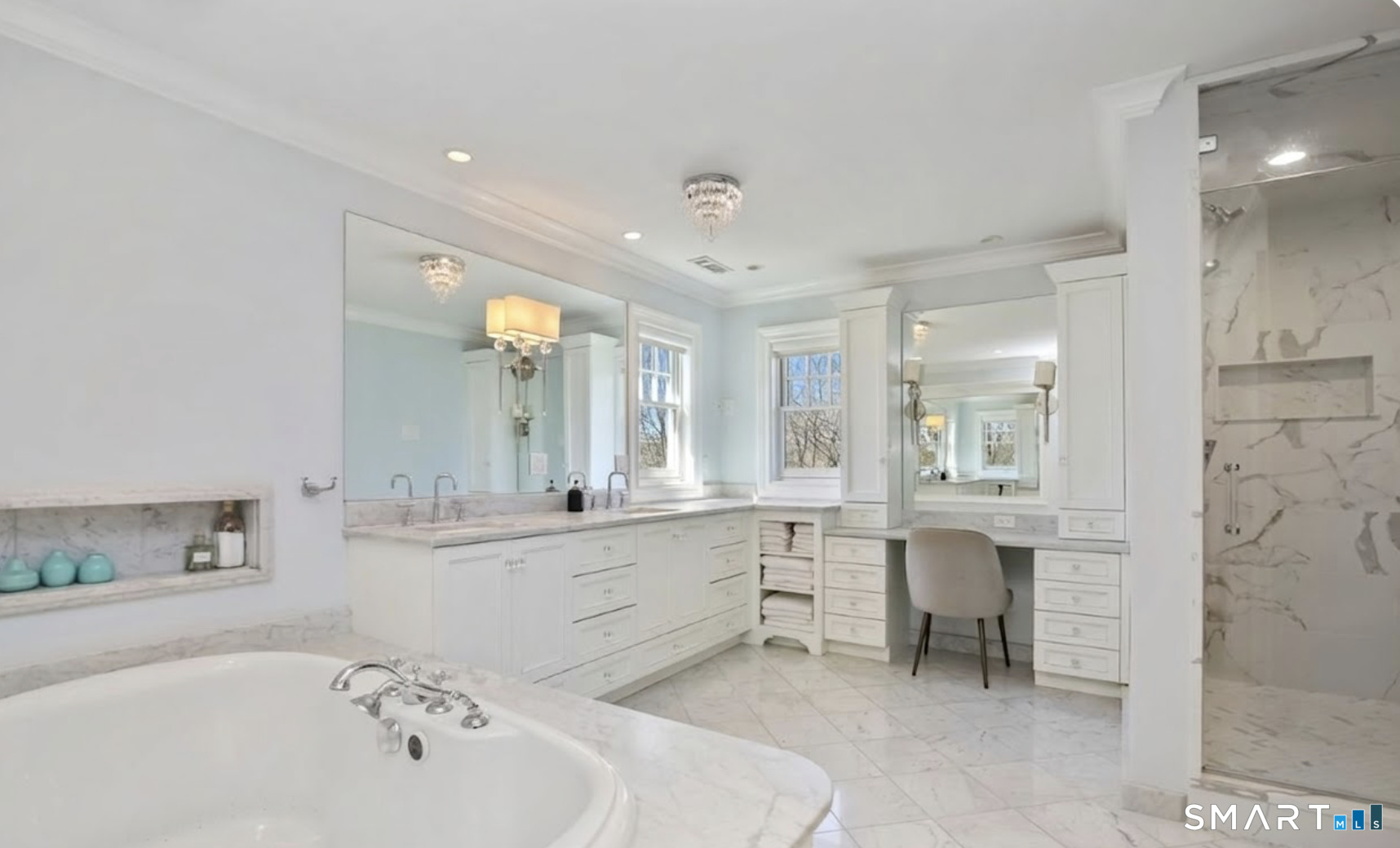 127 Fields Rock Road Fairfield, CT 06890 - Photo 20 of 40 a large bathroom with a large tub and sink