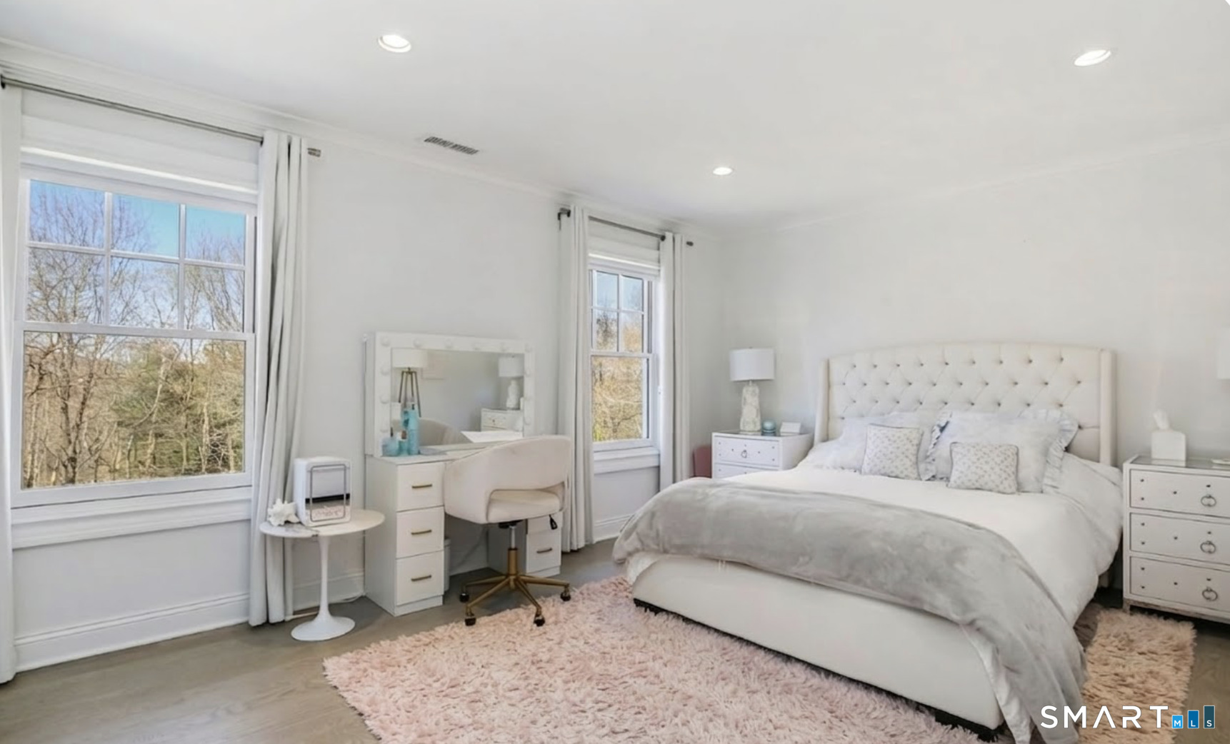 127 Fields Rock Road Fairfield, CT 06890 - Photo 21 of 40 a bedroom with a bed and a table