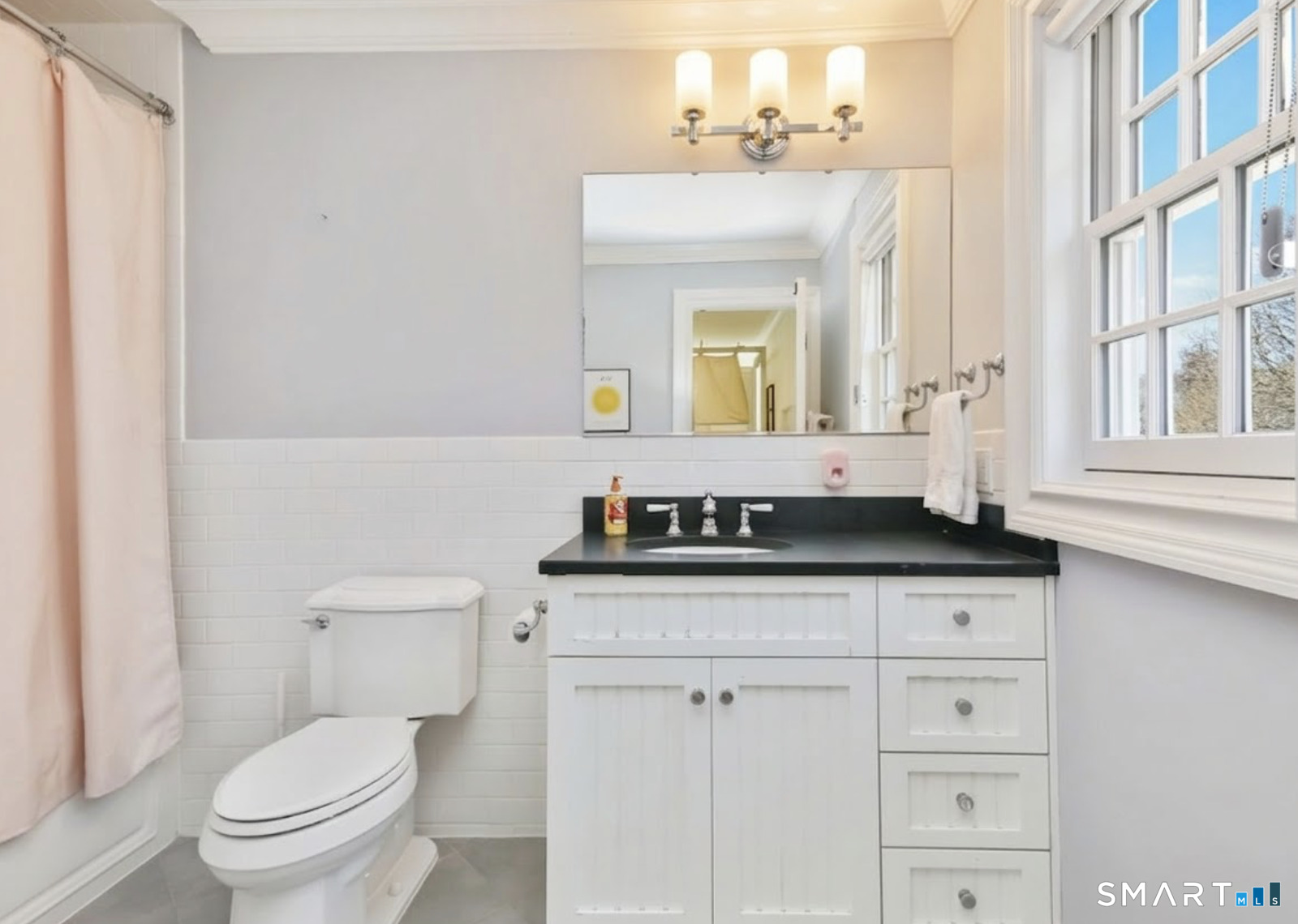 127 Fields Rock Road Fairfield, CT 06890 - Photo 24 of 40 a bathroom with a sink and a toilet