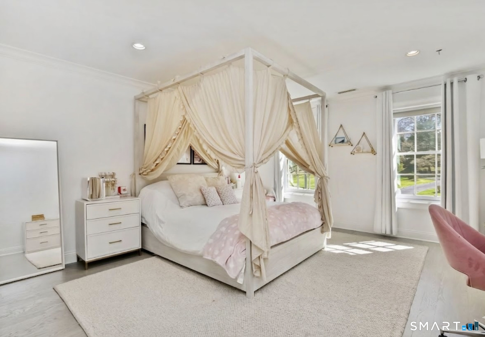 127 Fields Rock Road Fairfield, CT 06890 - Photo 25 of 45 a spacious bedroom with a bed and a window