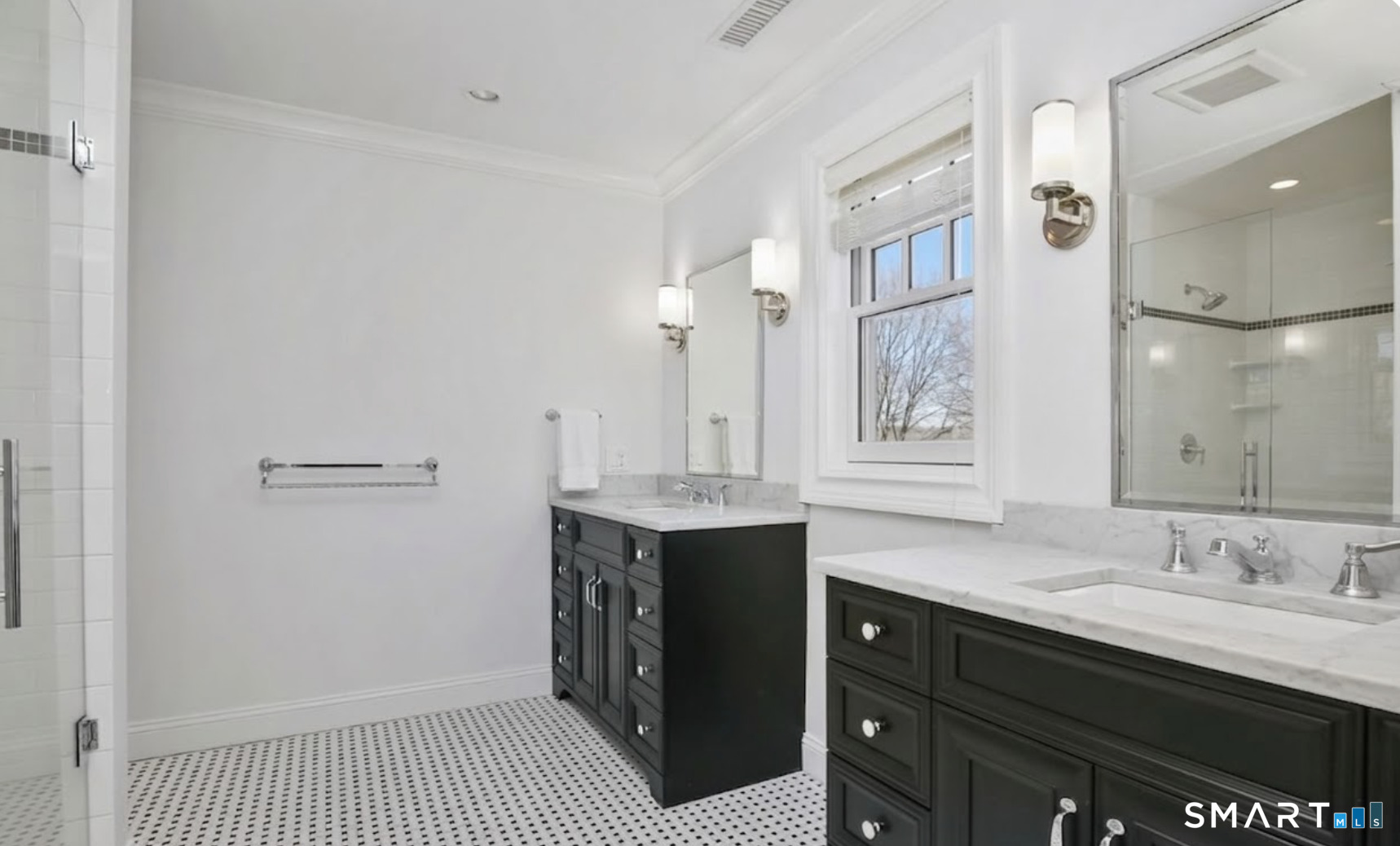 127 Fields Rock Road Fairfield, CT 06890 - Photo 26 of 45 a spacious bathroom with a granite countertop sink and a mirror