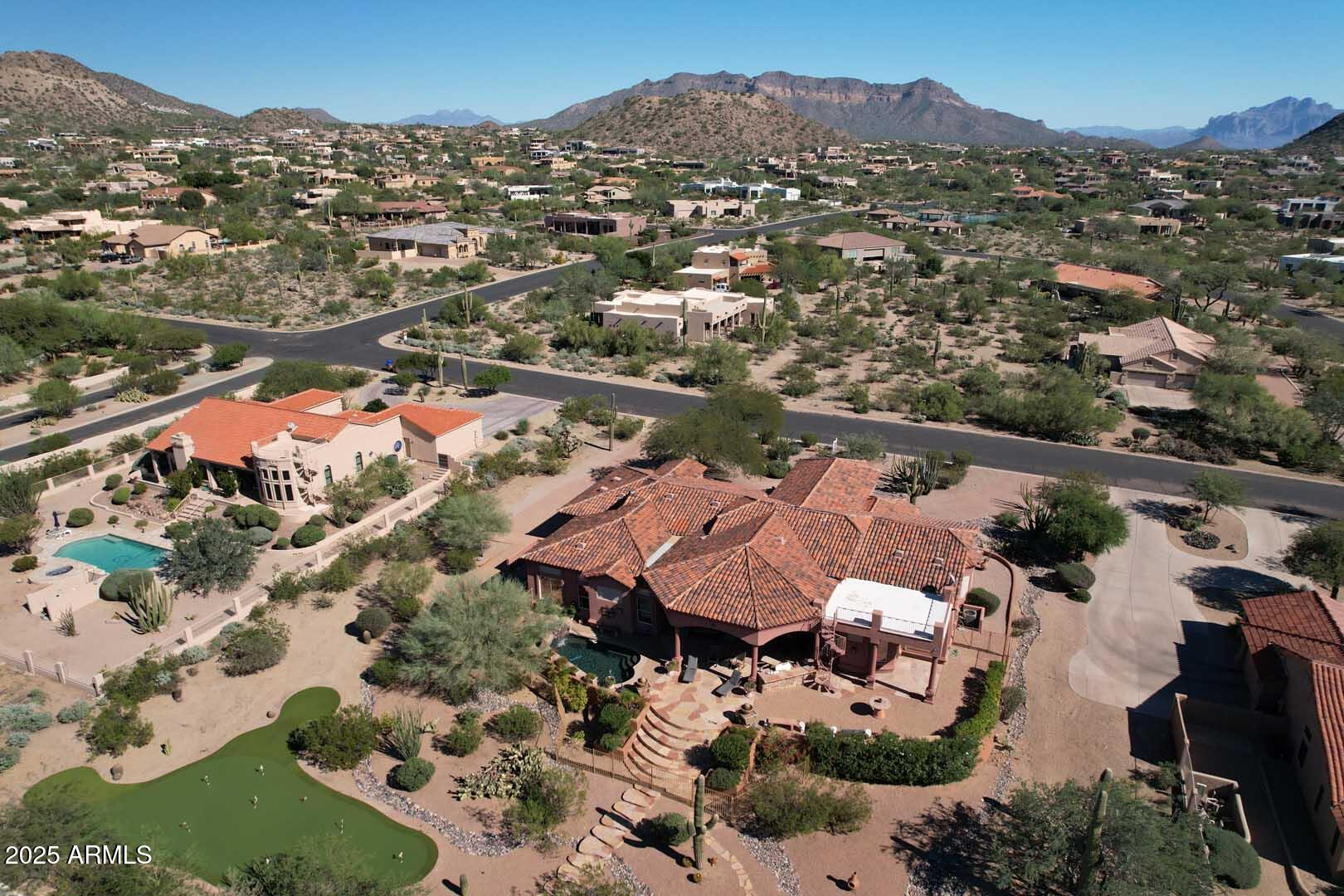 8540 East McDowell Road, Unit 55 Mesa, AZ 85207 - Photo 104 of 111 an aerial view of residential houses with outdoor space