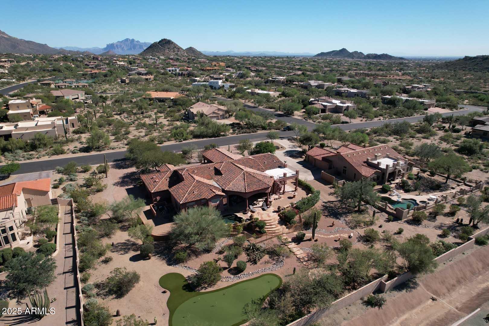 8540 East McDowell Road, Unit 55 Mesa, AZ 85207 - Photo 106 of 111 an aerial view of residential houses with city view
