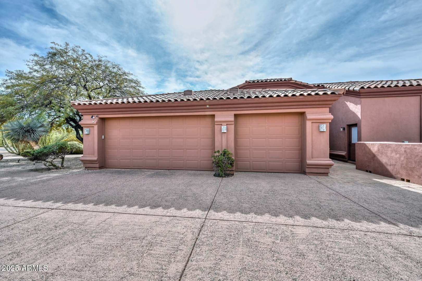 8540 East McDowell Road, Unit 55 Mesa, AZ 85207 - Photo 11 of 111 a front view of a house