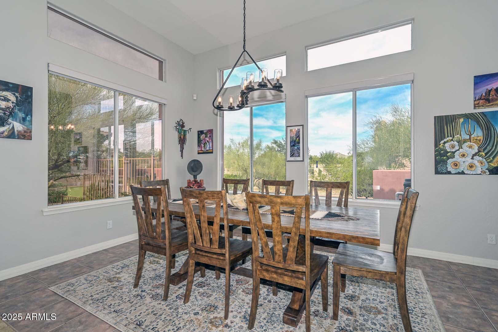 8540 East McDowell Road, Unit 55 Mesa, AZ 85207 - Photo 40 of 111 a view of a dining room with furniture window and outside view