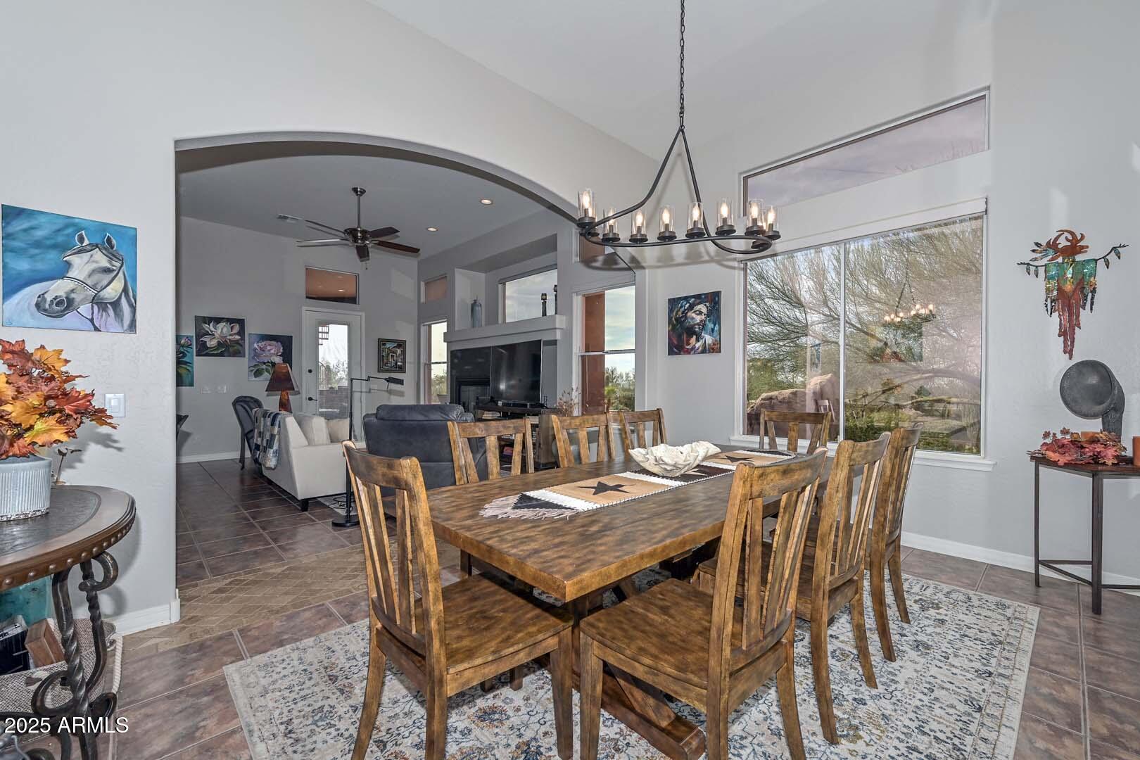 8540 East McDowell Road, Unit 55 Mesa, AZ 85207 - Photo 41 of 111 a view of a dining room with furniture window and wooden floor