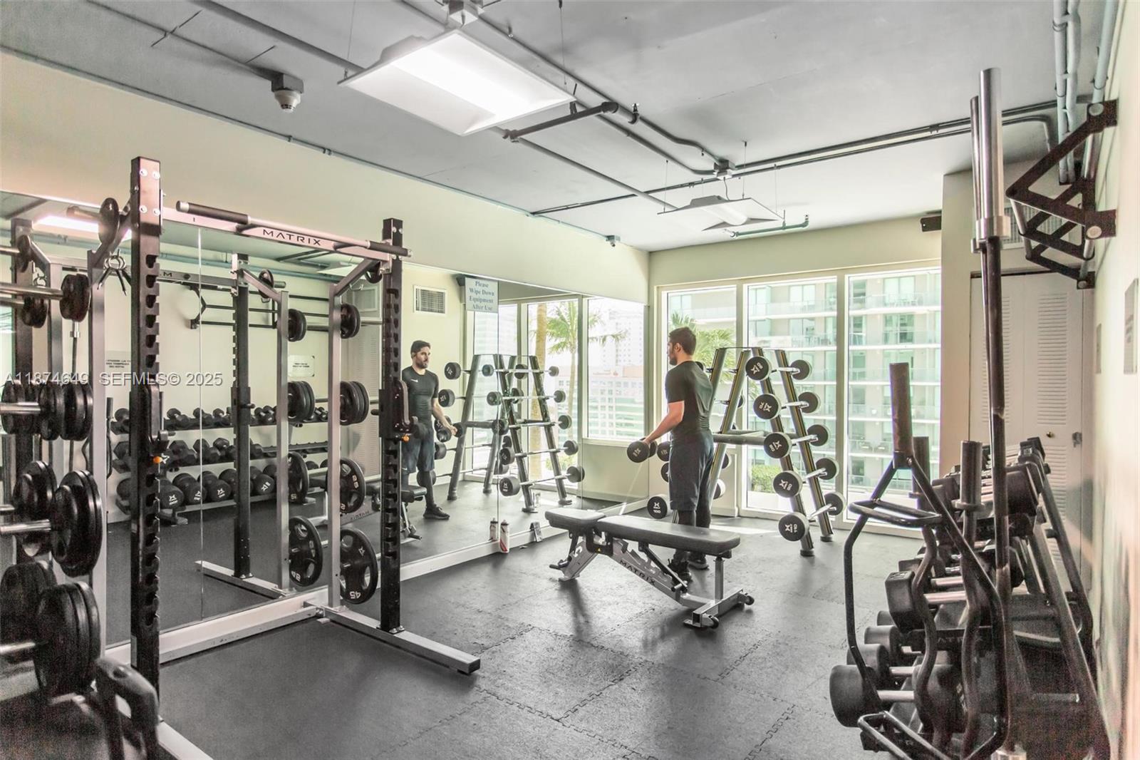 60 Southwest 13th Street, Unit 4413 Miami, FL 33130 - Photo 36 of 41 a view of a room with gym equipment