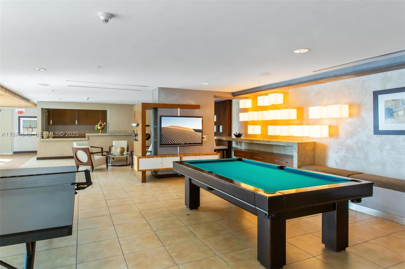 60 Southwest 13th Street, Unit 4413 Miami, FL 33130 - Photo 37 of 41 a room with furniture and pool table