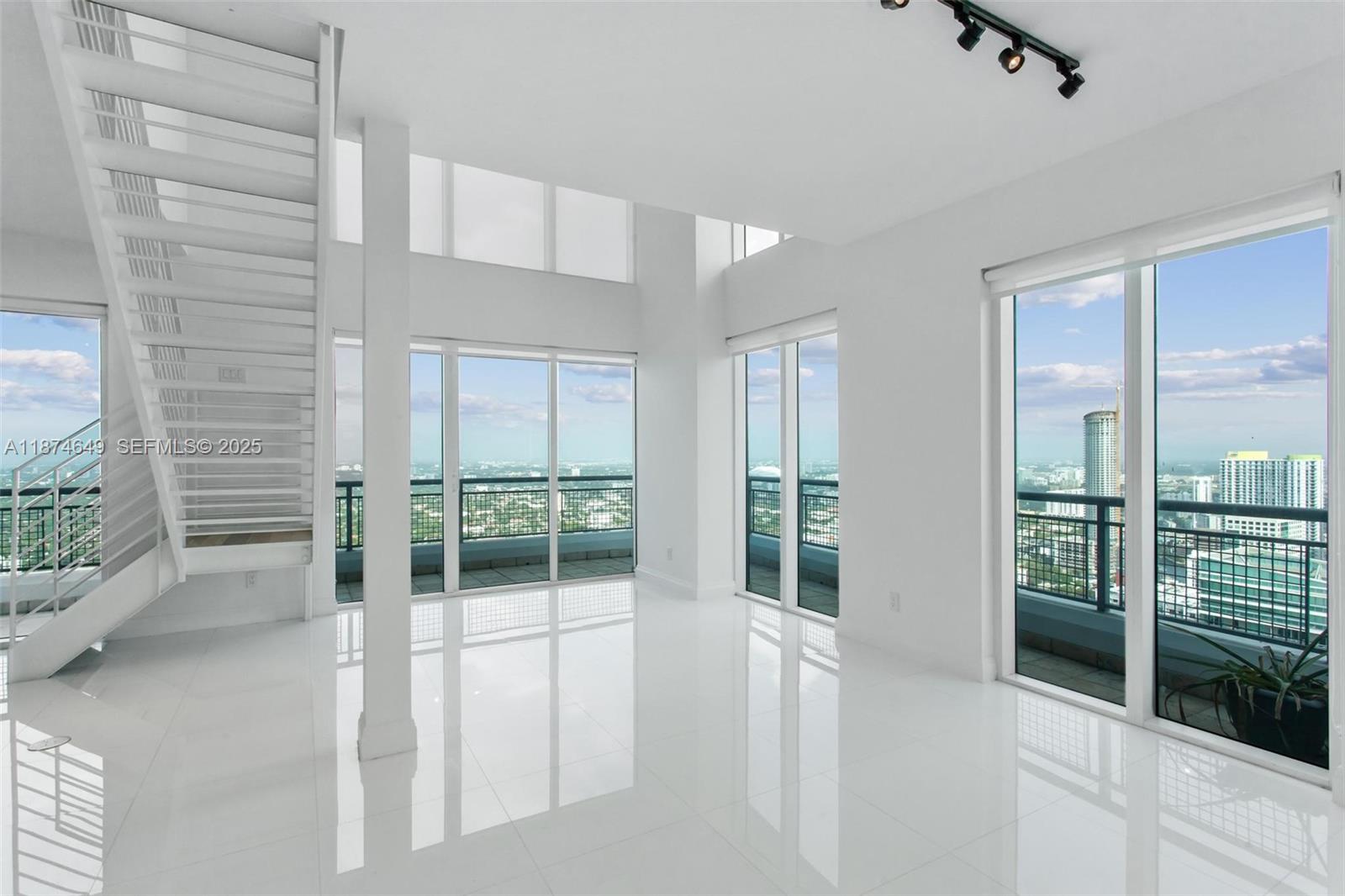 60 Southwest 13th Street, Unit 4413 Miami, FL 33130 - Photo 7 of 41 a view of a room with balcony