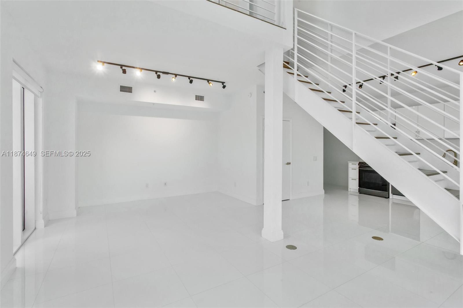 60 Southwest 13th Street, Unit 4413 Miami, FL 33130 - Photo 8 of 41 a view of a hallway with closet