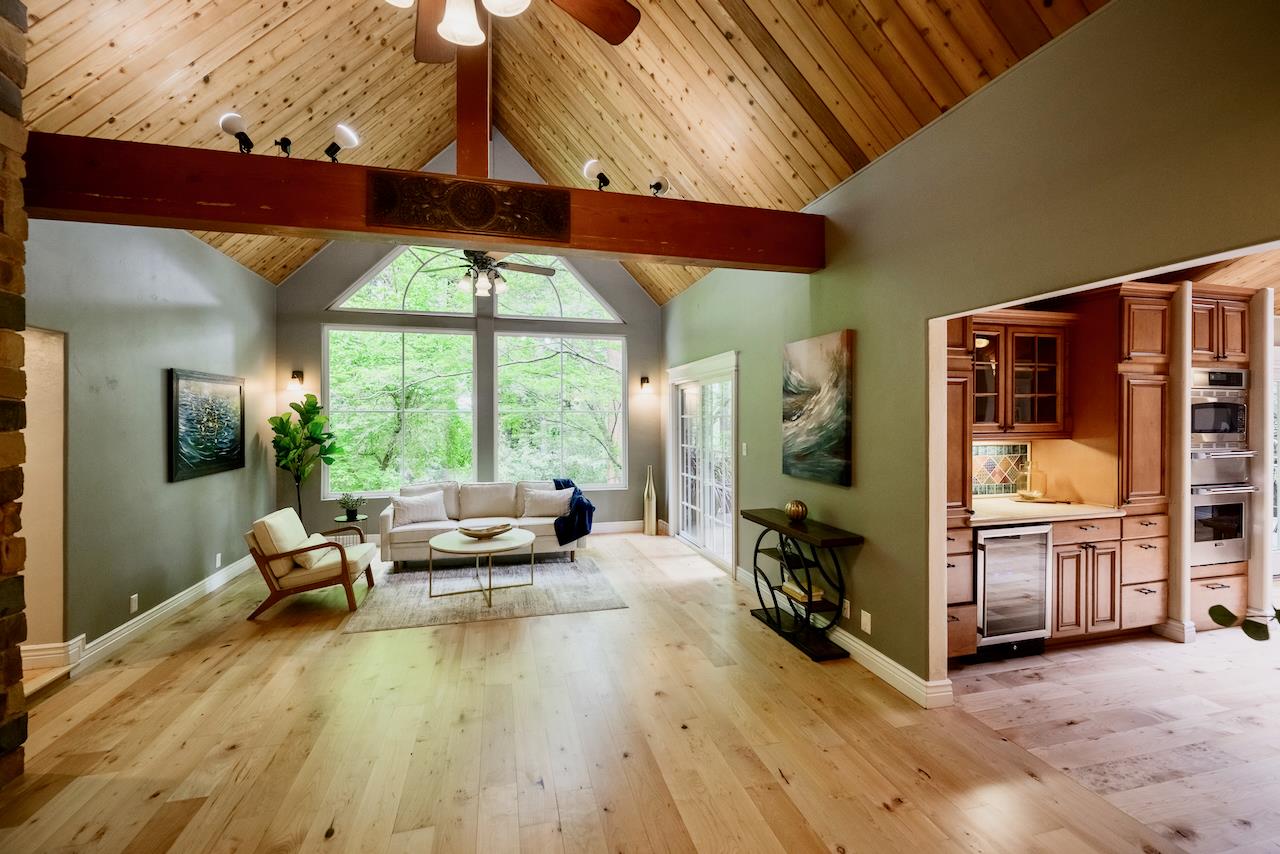 295 Jim's Road Ben Lomond, CA 95005 - Photo 12 of 139 a living room with furniture and large windows