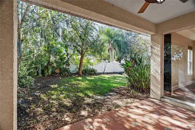 a view of a backyard with garden