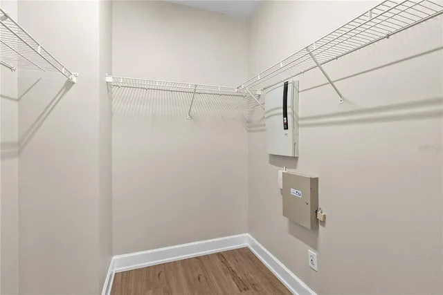 a view of a room with racks on the wall