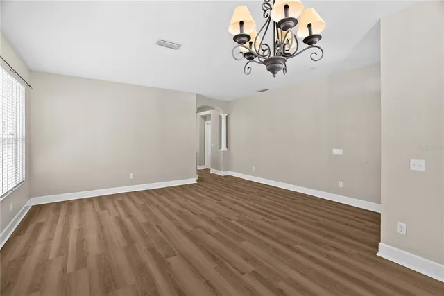 a view of a livingroom with wooden floor