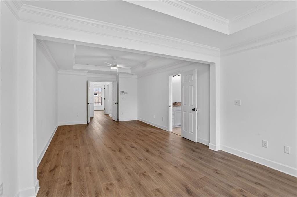 3267 Ferncliff Lane Atlanta, GA 30324 - Photo 14 of 25 a view of a hallway with wooden floor