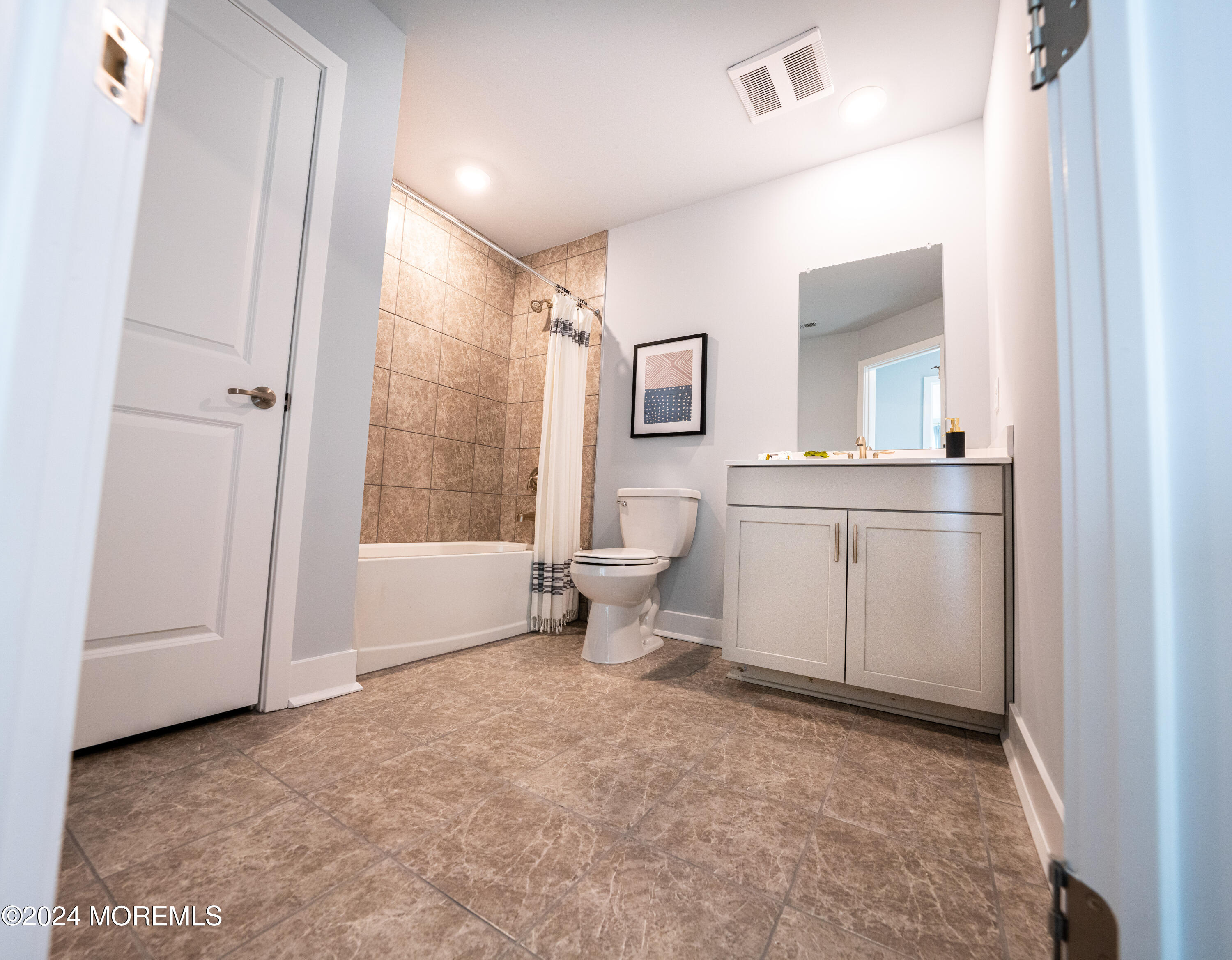 4 Midway Road South Tinton Falls, NJ 07724 - Photo 13 of 19 a spacious bathroom with a toilet sink and shower