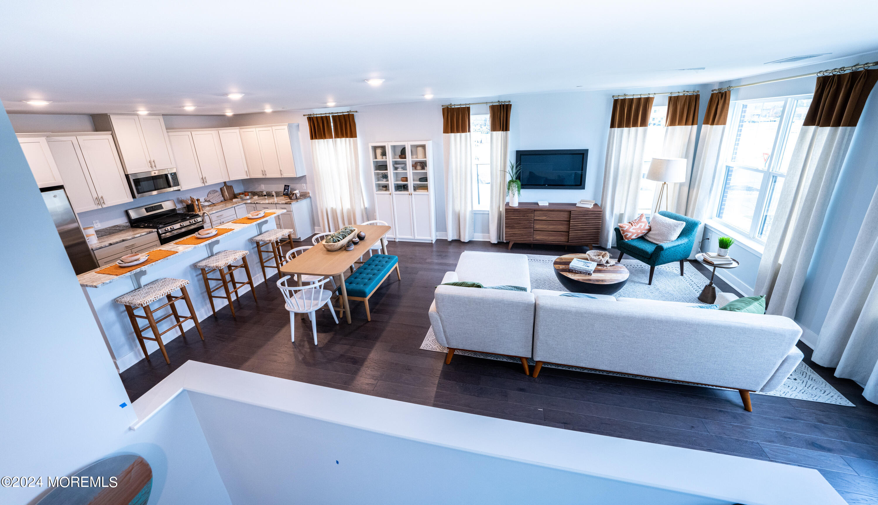 4 Midway Road South Tinton Falls, NJ 07724 - Photo 2 of 19 a living room with furniture and a flat screen tv