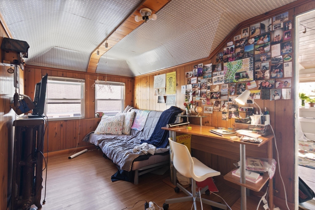 25-27 Upland Road Somerville, MA 02144 - Photo 16 of 38 a living room with furniture and a window