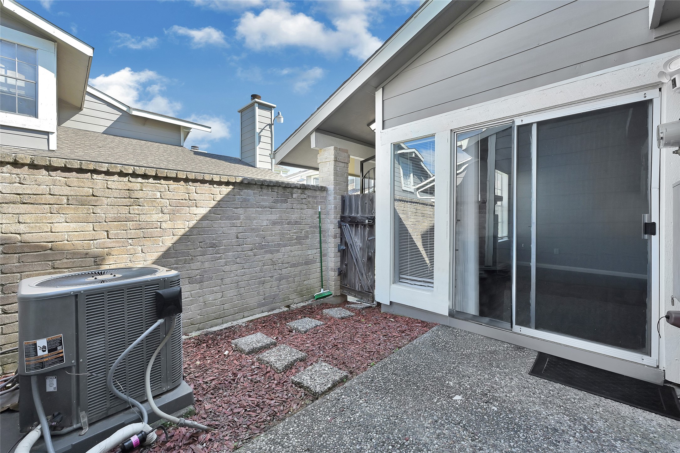12111 Lemon Ridge Lane, Unit 121 Houston, TX 77035 - Photo 6 of 25 a view of front door of house
