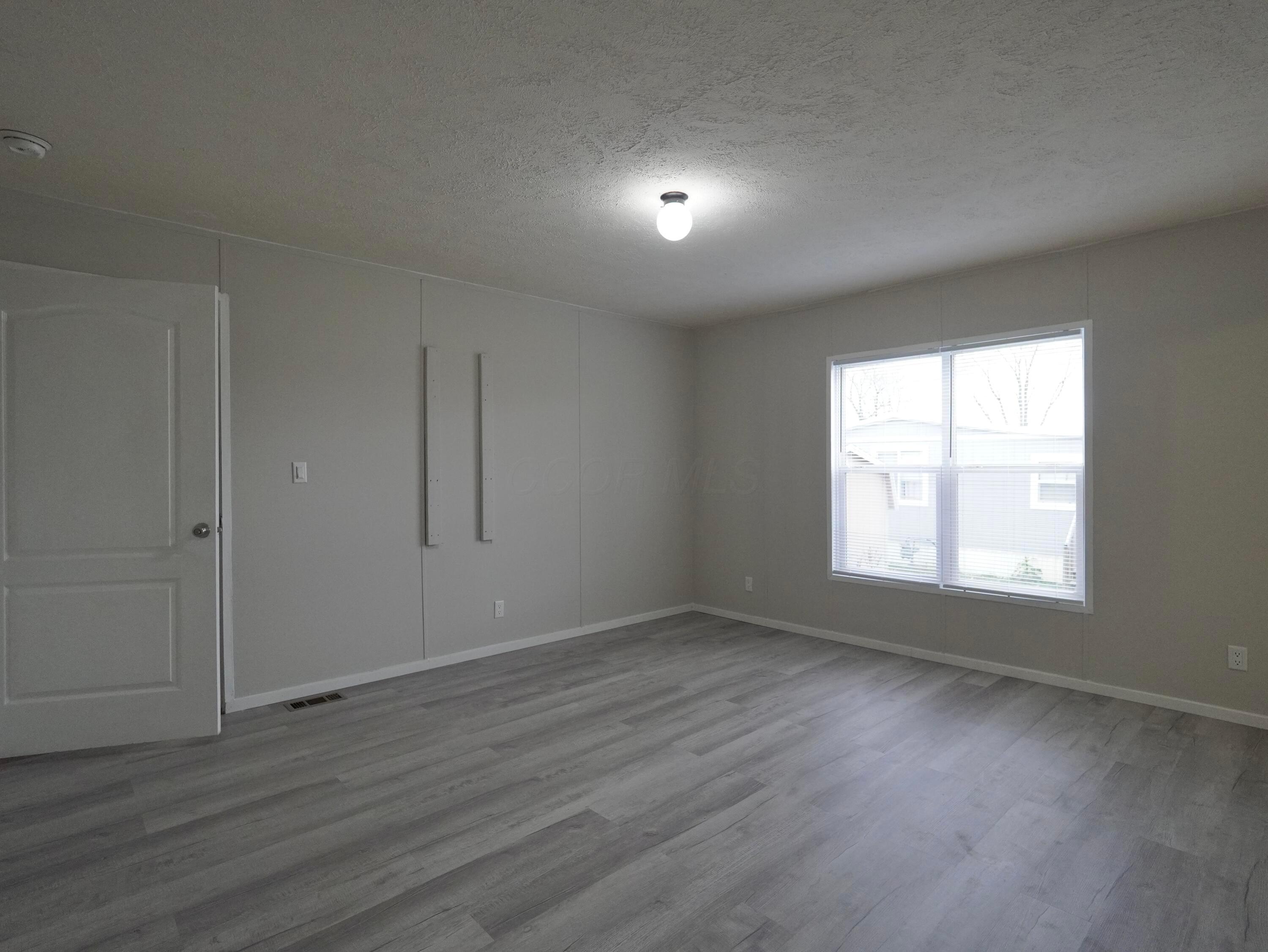 8565 Smith-Calhoun Road, Unit 128 Plain City, OH 43064 - Photo 12 of 22 Primary Suite