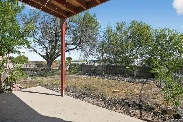 a view of a backyard space