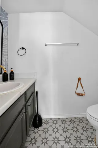 a bathroom with a sink and a toilet