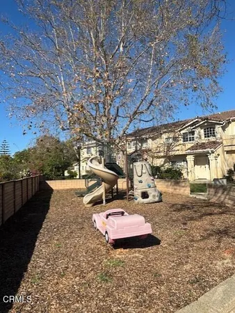 a view of yard with outdoor seating
