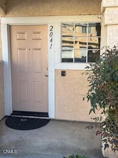 a view of a entryway door of the house