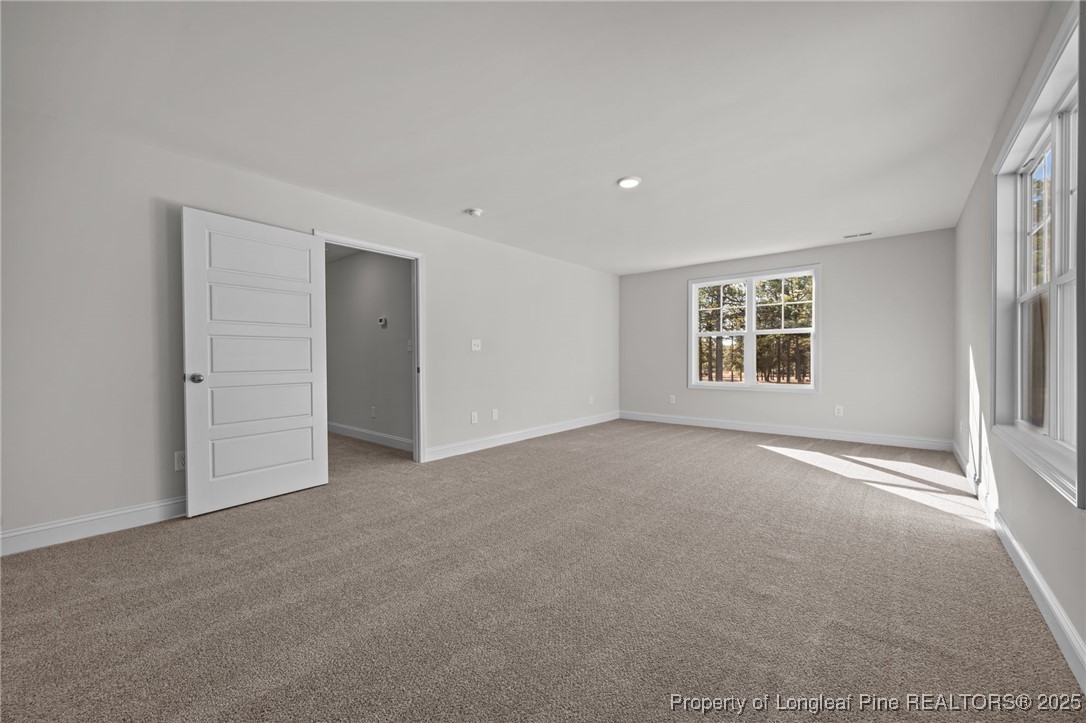 785 Quewhiffle (lot 3) Road Aberdeen, NC 28315 - Photo 21 of 50 a view of an empty room with a window