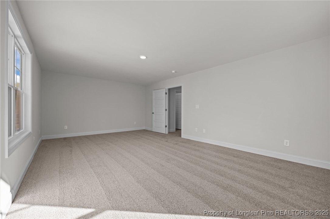 785 Quewhiffle (lot 3) Road Aberdeen, NC 28315 - Photo 22 of 50 a view of an empty room with a window