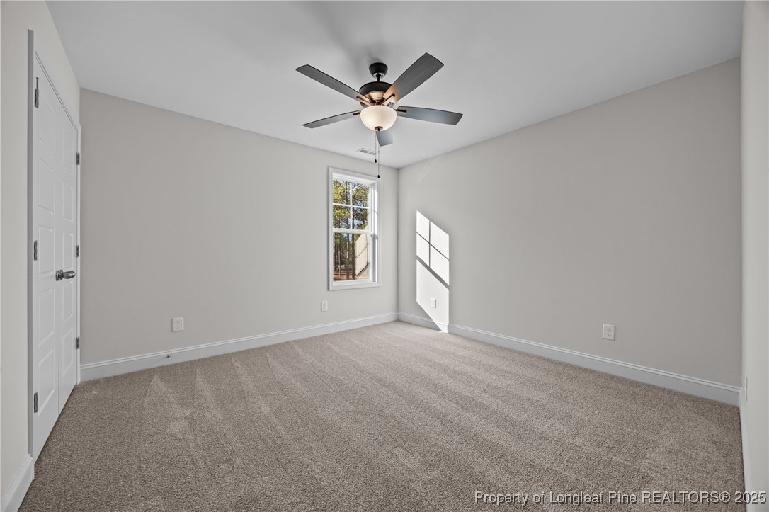 785 Quewhiffle (lot 3) Road Aberdeen, NC 28315 - Photo 25 of 50 a view of an empty room with a window