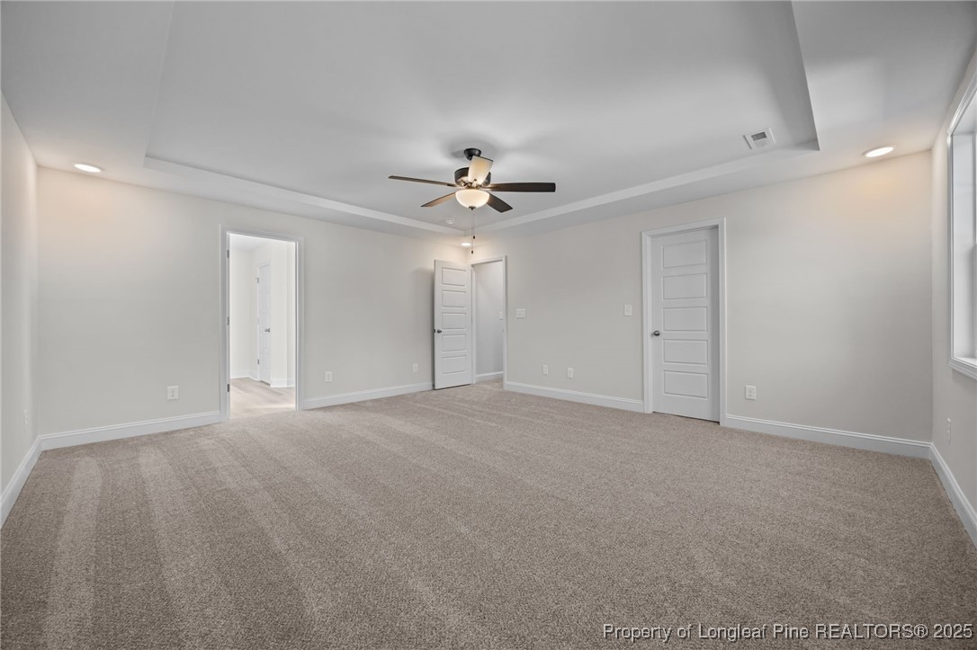 785 Quewhiffle (lot 3) Road Aberdeen, NC 28315 - Photo 29 of 50 a view of an empty room with a ceiling fan