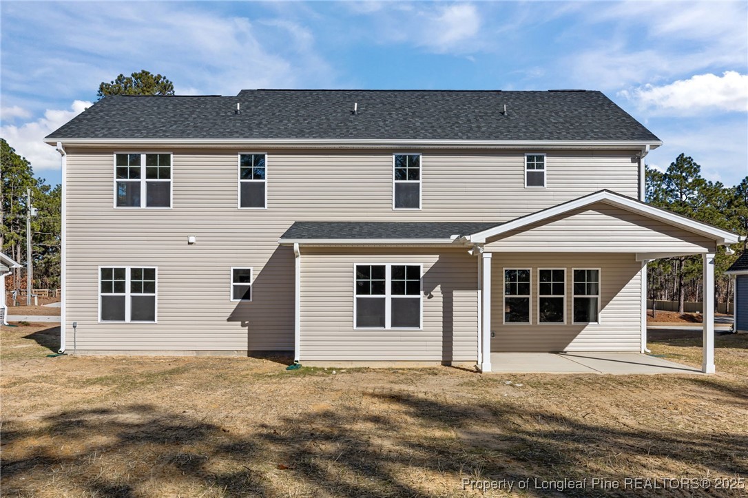785 Quewhiffle (lot 3) Road Aberdeen, NC 28315 - Photo 39 of 50 a house with white door