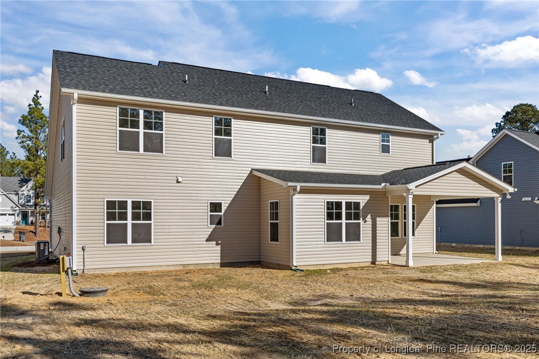785 Quewhiffle (lot 3) Road Aberdeen, NC 28315 - Photo 40 of 50 a house that has a window in front of it