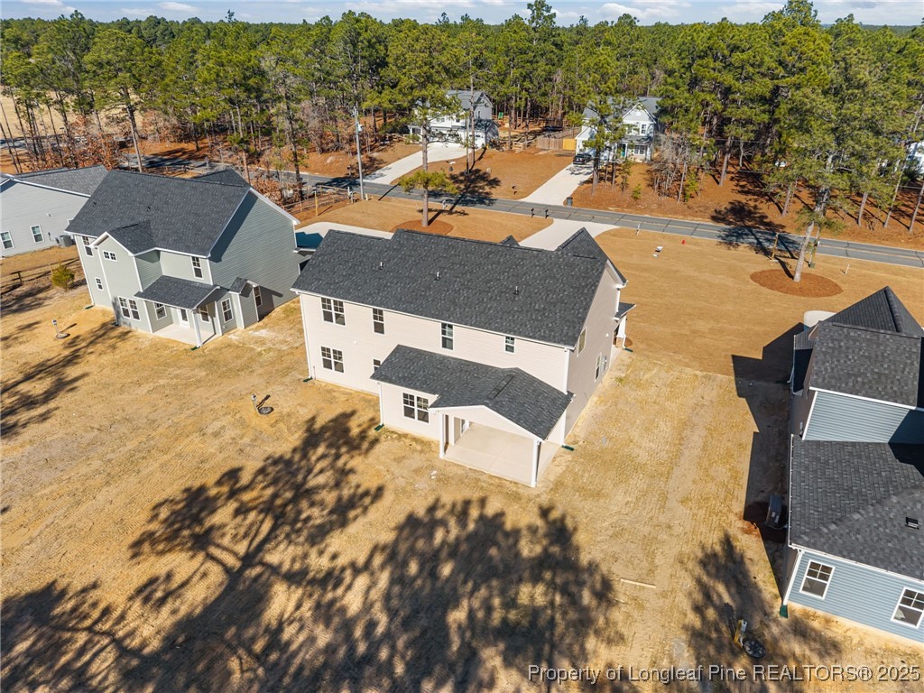 785 Quewhiffle (lot 3) Road Aberdeen, NC 28315 - Photo 48 of 50 an aerial view of residential houses with outdoor space