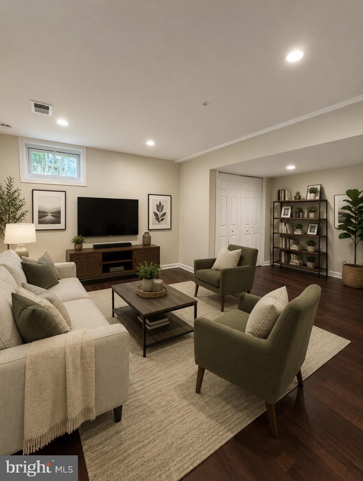 13952 Bishops Bequest Road Upper Marlboro, MD 20772 - Photo 4 of 28 a living room with furniture and a flat screen tv