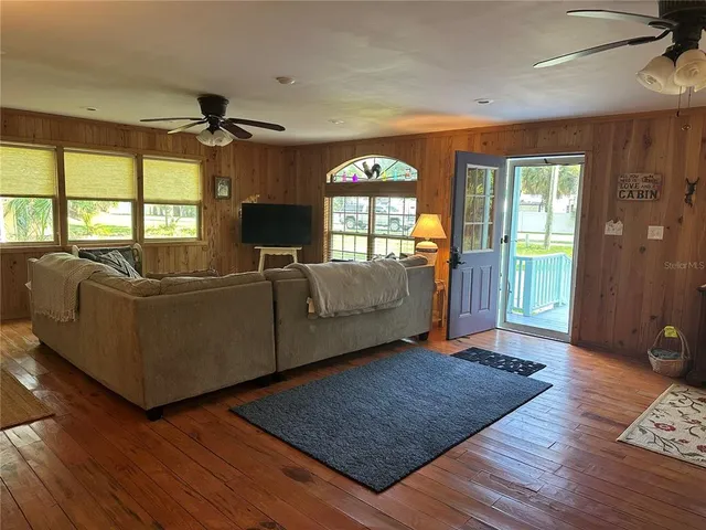 a living room with furniture and a couch