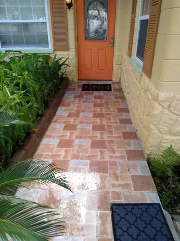 a house view with a garden space