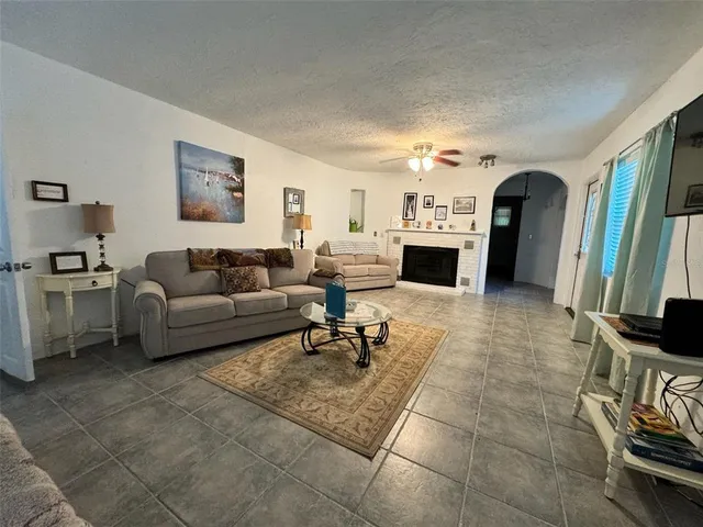 a view of a dining room with furniture and window