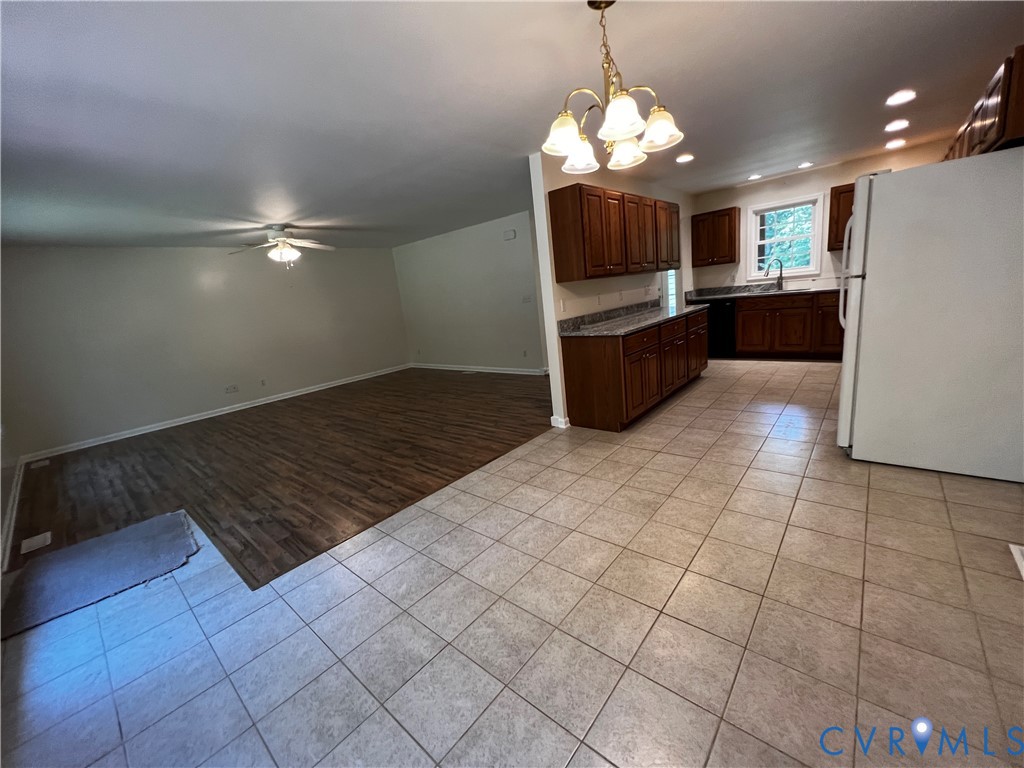 594 Landing Road Farmville, VA 23901 - Photo 5 of 21 a view of a kitchen with microwave and cabinets
