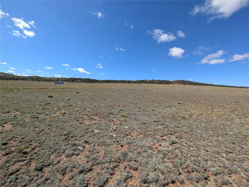 2895 Summit Road Hartsel, CO 80449 - Photo 8 of 13 a view of an ocean beach and a yard