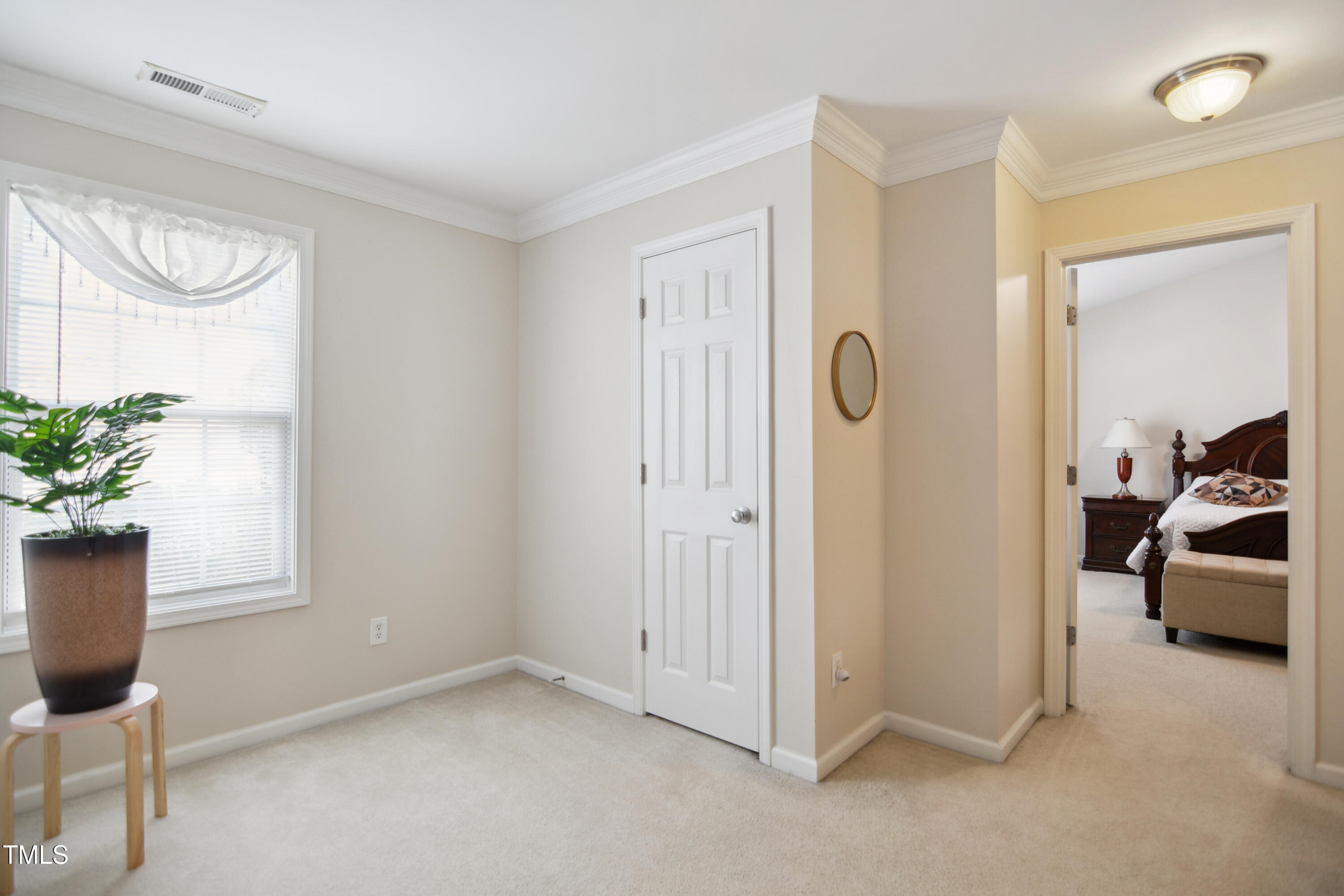 101 Whitney Lane Durham, NC 27713 - Photo 17 of 28 a view of room with furniture and closet